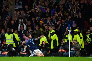 Scotland striker Lyndon Dykes celebrates after scoring against Ukraine