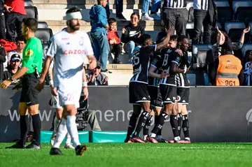 Angers players celebrate after scoring against Lille on Saturday as they claimed a first Ligue 1 win since September