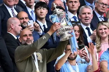 Pep Guardiola lifted his 11th major trophy as Manchester City manager on Saturday
