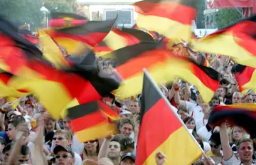 Germany supporters proudly wave flags during the 2006 World Cup, something that had seemed taboo for decades