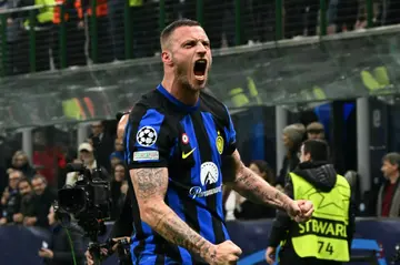 Marko Arnautovic celebrates after netting the winner for Inter Milan over Atletico Madrid