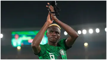 Nigeria's Victor Osimhen applauds the fans during the Africa Cup of Nations Round of 16 match against Cameroon.