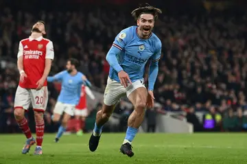 Manchester City's Jack Grealish celebrates after scoring at Arsenal