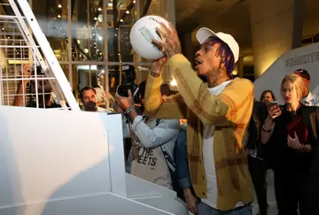 Wiz Khalifa plays airball at 1111 Lincoln Road on December 5, 2014, in Miami, Florida