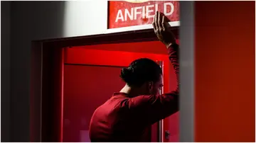Virgil van Dijk touching the "This is Anfield" sign during the Premier League match between Liverpool and Norwich City at Anfield. Photo by Andrew Powell.