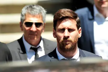 Lionel Messi and his father Jorge in action