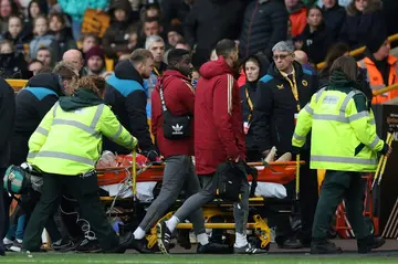 Worry: Arsenal's Frida Maanum is taken from the pitch on a stretcher after being taken ill