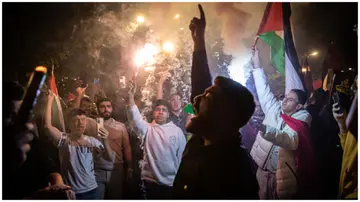 Residents protest amid the conflict between Israel and Hamas, following an attack on a music festival over the weekend.