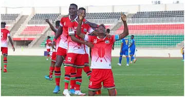 Michael Olunga celebrates with Harambee Stars teammates after scoring a goal during a past match. Photo: @OgadaOlunga.