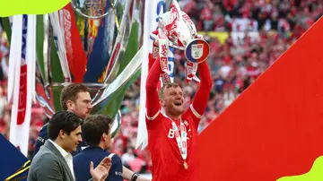 Joe Worrall lifts the Sky Bet Championship Play-Off trophy at Wembley Stadium on 29 May 2022 in London