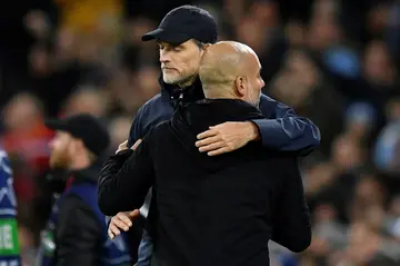 Bayern Munich head coach Thomas Tuchel hugs Man City manager Pep Guardiola