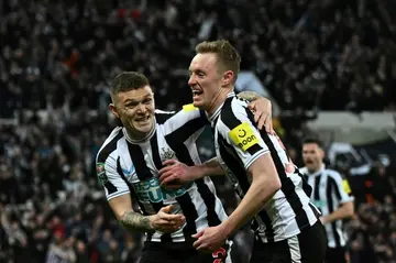 Newcastle's Sean Longstaff (R) celebrates scoring against Southampton