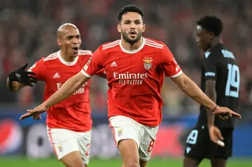 Benfica striker Goncalo Ramos (C) celebrates scoring against Club Brugge in the Champions League quarter-final