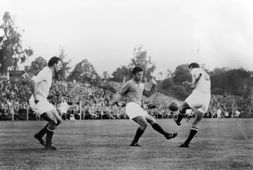 Just Fontaine (C) playing for France against Yugoslavia at the 1958 World Cup in Sweden. His tally of 13 goals at that tournament is a record that may never be matched