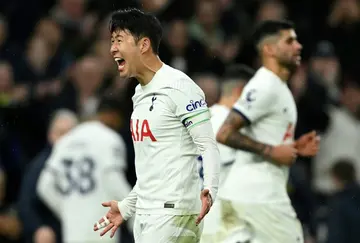 Tottenham forward Son Heung-min celebrates his side's winner against Brighton