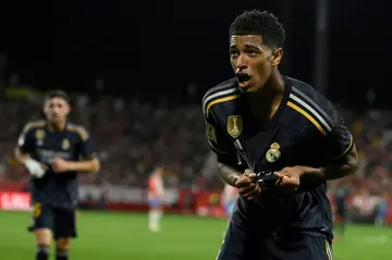 Real Madrid's English midfielder Jude Bellingham celebrates after netting the third as his team burst Girona's bubble at Montilivi