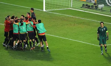 Spain celebrate their penalty shoot-out win over Italy