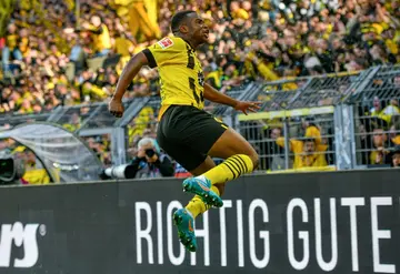 Dortmund's Youssoufa Moukoko celebrates his winner against Schalke