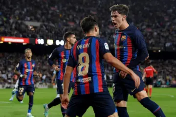 Barcelona's Spanish midfielder Pedri celebrates scoring the opening goal against Celta Vigo