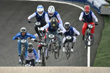 Romain Mahieu (C) wins the men's Elite BMX Final