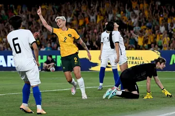 Michelle Heyman celebrates scoring a goal for Australia against Uzbekistan