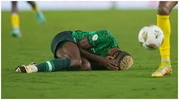 Victor Osimhen on the ground during the CAF Africa Cup of Nations quarter-final match between Nigeria and Angola. Photo: Ulrik Pedersen.