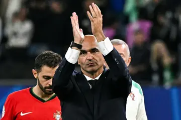 Portugal coach Roberto Martinez said his team were eliminated with "pride" and would come back stronger after France defeat