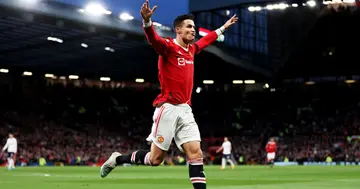 Cristiano Ronaldo celebrates after scoring their side's second goal during the Premier League match between Manchester United and Tottenham Hotspur at Old Trafford on March 12, 2022 in Manchester, England. (Photo by Naomi Baker/Getty Images)