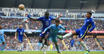 Thiago Silva of Chelsea clears the ball from Bernardo Silva of Manchester City watched by Malang Sarr of Chelsea during the Premier League match between Manchester City and Chelsea (Photo by Simon Stacpoole/Offside/Offside via Getty Images)