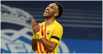 Barcelona's Pierre-Emerick Aubameyang celebrates scoring his team's first goal during the Spanish League football match between Real Madrid CF and FC Barcelona. Photo by PIERRE-PHILIPPE MARCOU.