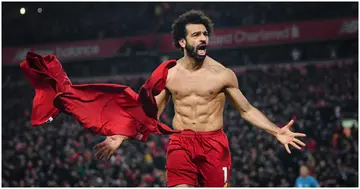Mo Salah celebrates after scoring for Liverpool during a past match. Photo: Getty Images.