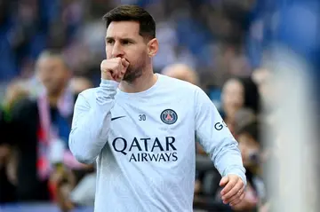 Lionel Messi warms up before Paris Saint-Germain's match against Auxerre