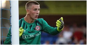 Patrik Gunnarsson in action during the pre-season friendly between AFC Wimbledon and Brentford at The Cherry Red Records Stadium. Photo by Ker Robertson.