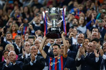 Busquets with the La lIga trophy