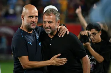 Barcelona manager Hansi Flick, right, was facing off against former Barca player and manager Pep Guardiola