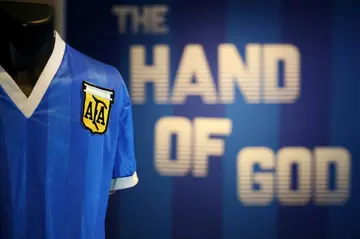 The jersey worn by Diego Maradona when he scored twice against England in the 1986 World Cup, including the infamous "hand of God" goal, is displayed at Sotheby's in London