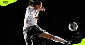 A female soccer player in action.