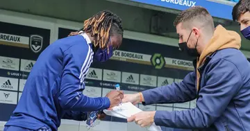 Ghana defender Gideon Mensah signing autographs for Bordeaux fans. Credit: @gideonmensah_14