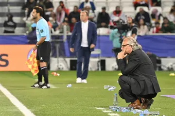 During Monday night's win, the coach prowled the touchline wearing a black suit and shirt, urging and cajoling his players throughout the emotional wringer of a match