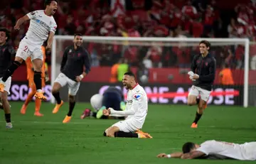 Sevilla's Moroccan forward Youssef En-Nesyri (C) celebrates his team's  qualification for the Europa League final