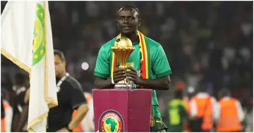 Sadio Mane lifts the AFCON title Senegal won in Cameroon in 2021.