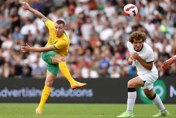 Australia's Mitch Duke takes a shot against New Zealand