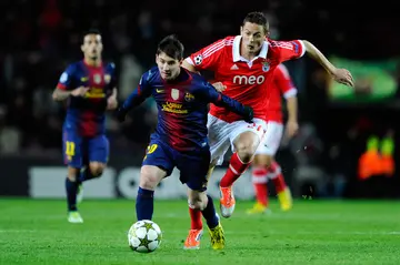 Lionel Messi with Nemanja Matic at Nou Camp