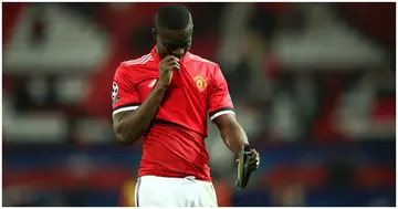 Eric Bailly looks dejected in defeat after the UEFA Champions League Round of 16 Second Leg match between Manchester United and Sevilla. Photo by Clive Mason.