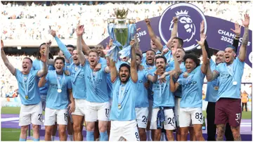 Manchester City lifts the Premier League trophy following the Premier League match between them and Chelsea FC at Etihad Stadium. Photo by Catherine Ivill.