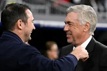 Real Madrid coach Carlo Ancelotti (R) greets Chelsea's Frank Lampard ahead of the first leg clash at the Santiago Bernabeu