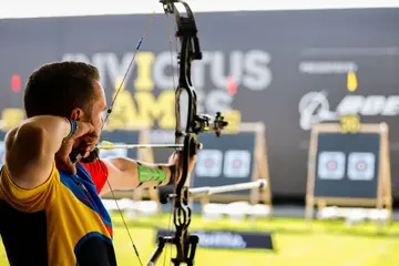 How to play archery?