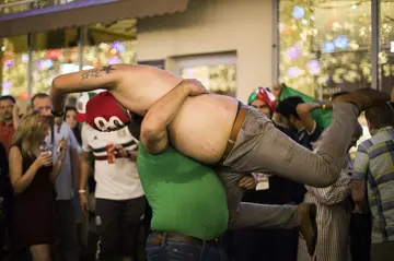 Mexican football fans party with tourists and revellers in Moscow during the 2018 World Cup