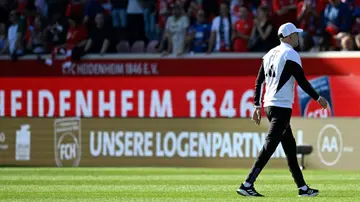 Bayern Munich coach Thomas Tuchel walks off after his side's 3-2 loss to Heidenheim on Saturday
