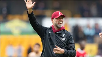 Jurgen Klopp waves to the fans after the Premier League match between Wolverhampton Wanderers and Liverpool at Molineux. Photo by Gustavo Pantano.